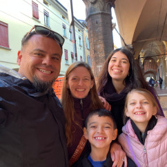Family Smiles Under Italy’s Archways