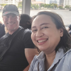 Smiles and skyline on a scenic ferry ride