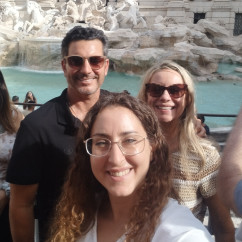 Sunlit Smiles by the Fountain of Wishes