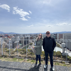Cityscapes and Smiles: A Rooftop Moment