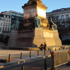 Sunlit Monument: A Golden Evening Encounter