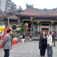 Glimpse into Tradition: A Moment at the Temple