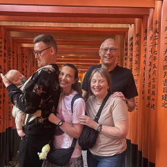 Family Moments at the Vibrant Torii Tunnel