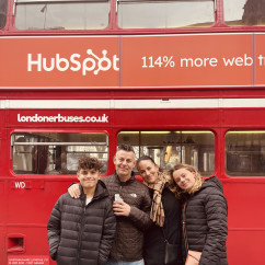 In Front of London's Iconic Red Bus: A Family Adventure