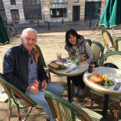 Sunlit Café: Sharing Moments Over Lunch