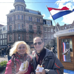 View of a man and woman by Hefferich building, Amsterdam.