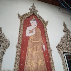 Wall mural of a deity in Wat Phra Singh, Chiang Mai.