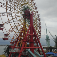 Ferris wheel beside Kobe Port Tower in Kobe, Japan.