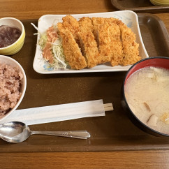 Savoring a cozy meal of katsu and miso soup in Naha.