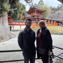 Exploring Nara's temple grounds amidst tranquil gardens and vibrant architecture.