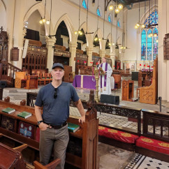St. Andrew's Cathedral (Hong Kong) interior with gothic arches and stained glass windows.