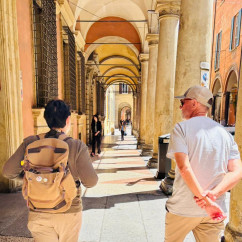 A casual walk reveals the timeless charm of Bologna's arches.