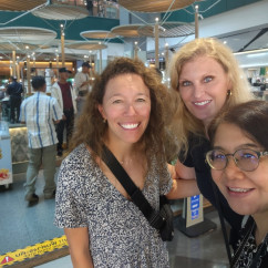 Enjoying a shared moment in a bright Bangkok shopping center.
