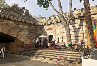 A group of locals enjoying a sunny day in Paris