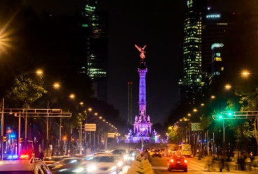 View of a busy street in Mexico City at night