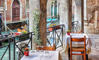 Typical canal-side restaurant in Venice