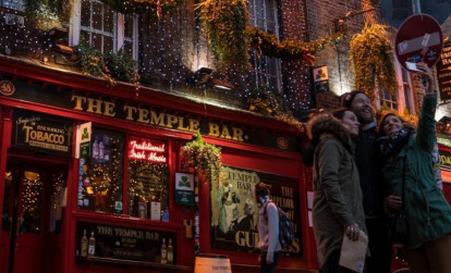 Locals outside a popular pub in Dublin after a night out