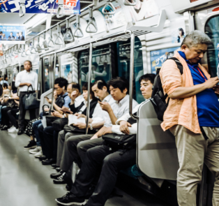 Travelers sitting on a train