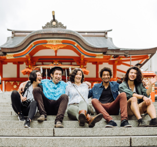 Travelers sitting in front of Hanazono-jinja Shrine