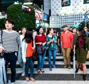 People crossing the busy Shibuya Crossing