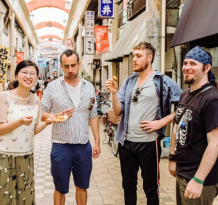 Tourists snacking in Asakusa