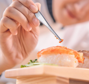 Sushi being prepared in Tokyo, Japan