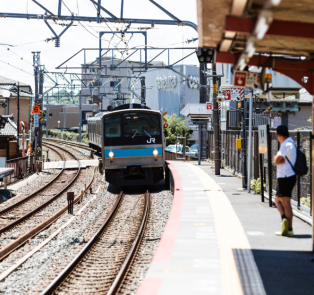 Travalers use local trains for the trips from Tokyo