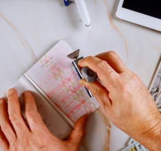 Tourist passport being stamped