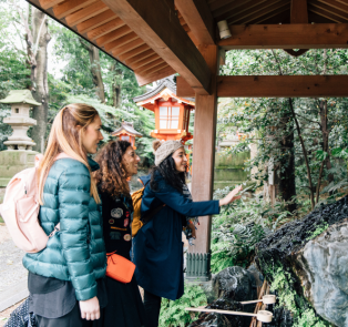 Travelers sightseeing with a local guide