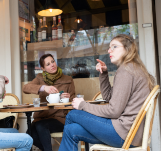 Tourists enjoying a meal in Paris