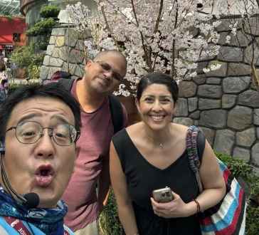 Blossoms and Smiles Under Glass Skies