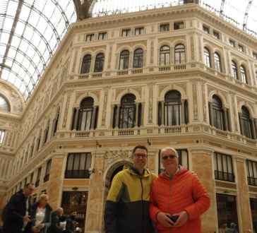 Strolling beneath the stunning glass dome of Galleria Umberto I.