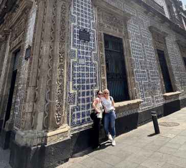 Sunlit Smiles Beside the Tiled House