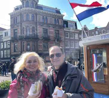View of a man and woman by Hefferich building, Amsterdam.