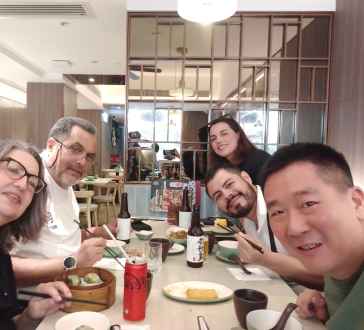 Sharing laughs over dim sum in a cozy Hong Kong eatery.
