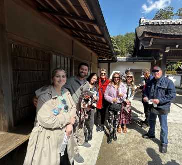 Sunlit Smiles in Kyoto's Tranquil Courtyard