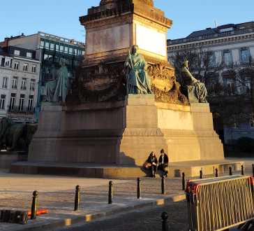 Sunlit Monument: A Golden Evening Encounter