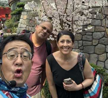 Blossoms and Smiles Under Glass Skies