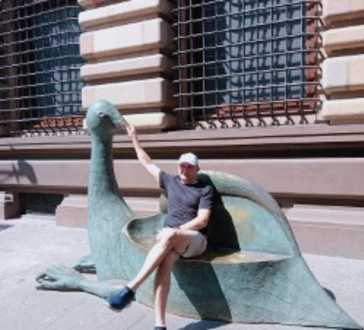 Relaxing on the Dragon Bench: A Moment of Leisure