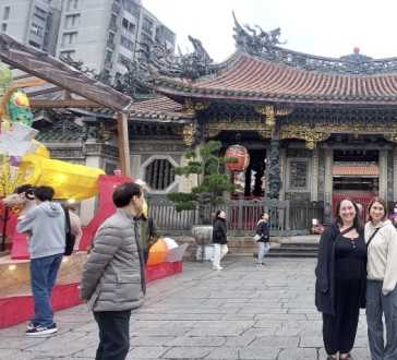 Glimpse into Tradition: A Moment at the Temple