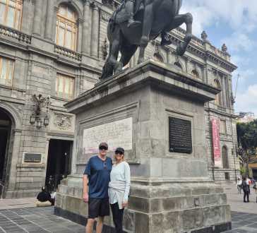 Majestic Moments Beneath Historic Statues