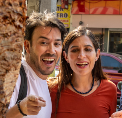 Hosts and guests in Mexico City at a taqueria