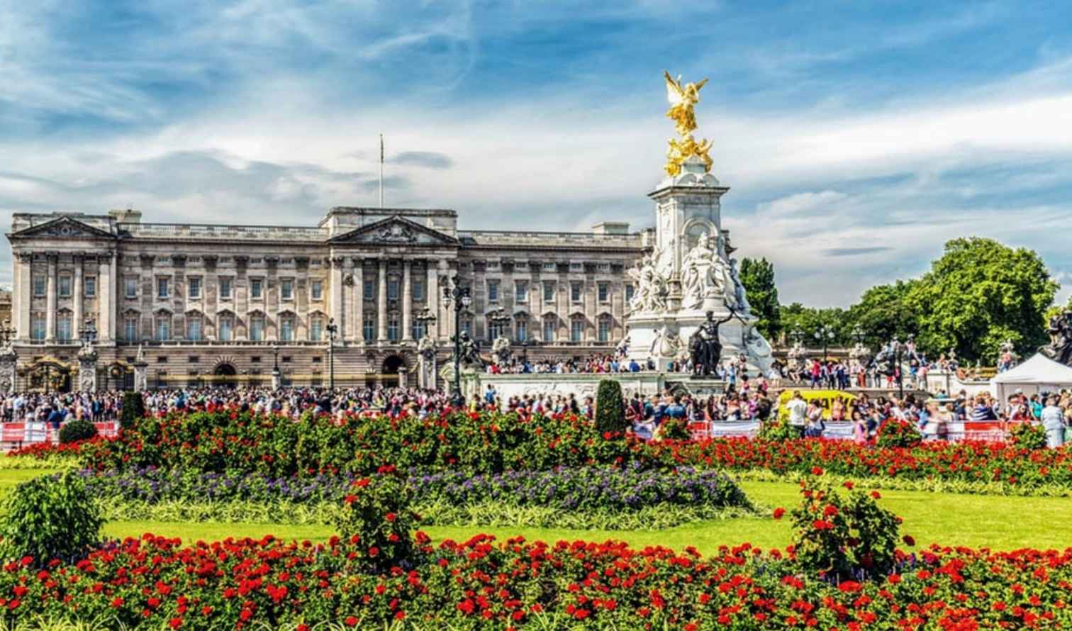 Elegant Majesty: Buckingham Palace in a Sea of Blossoms