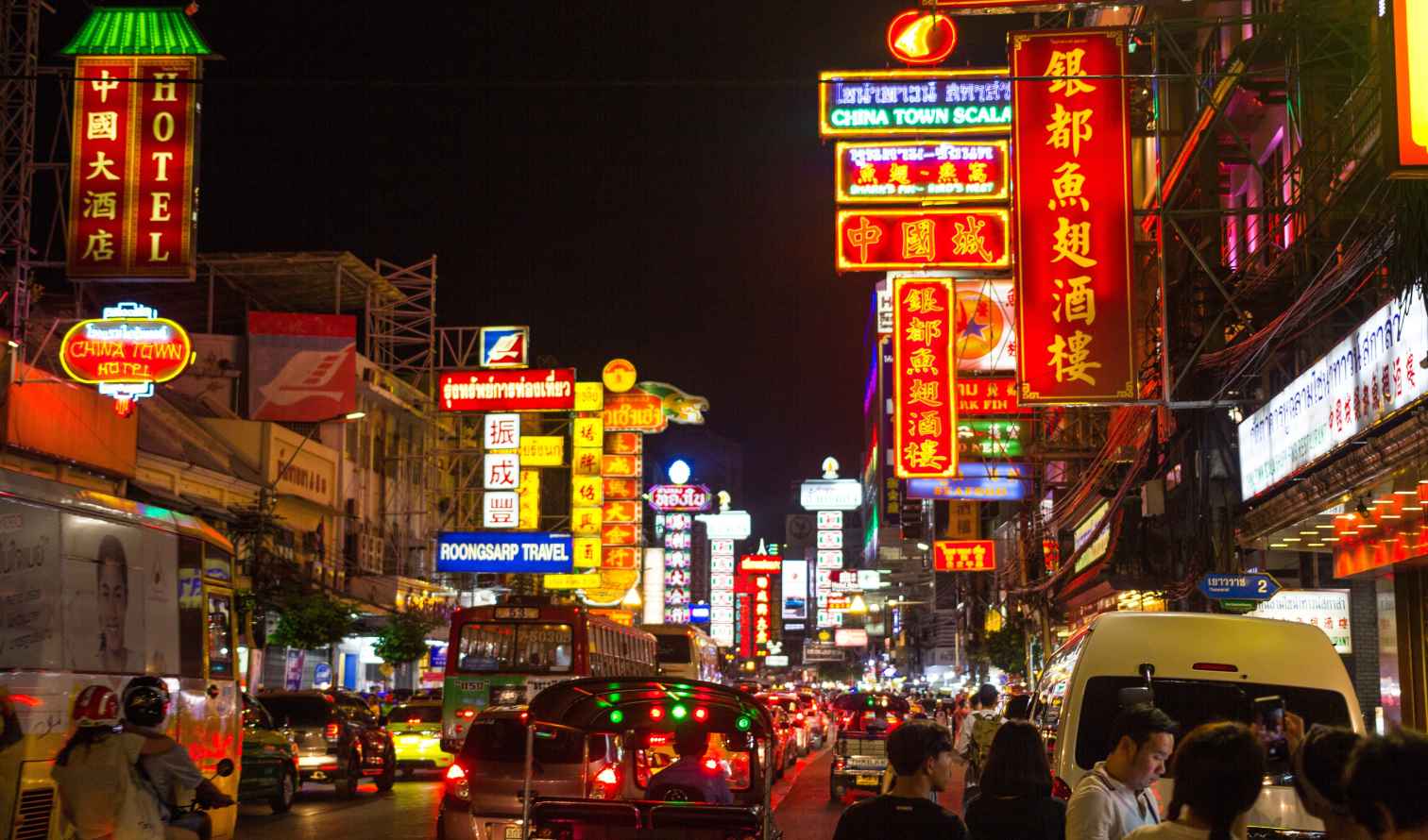 Nighttime view of Yaowarat Road in Bangkok's Chinatown.