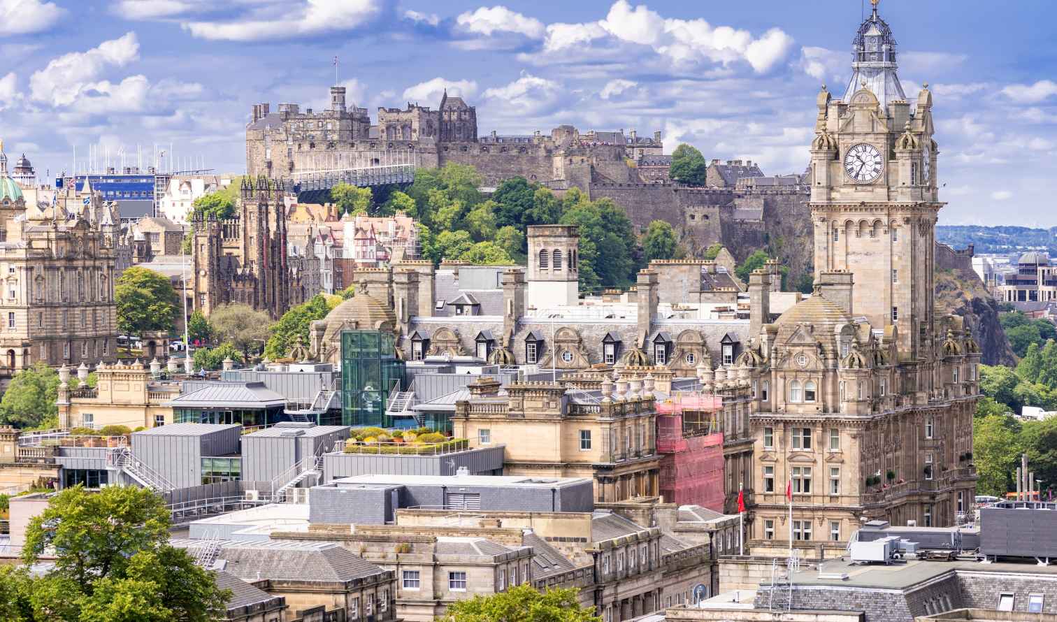 View of Edinburgh Castle and surrounding architecture in Edinburgh, Scotland.