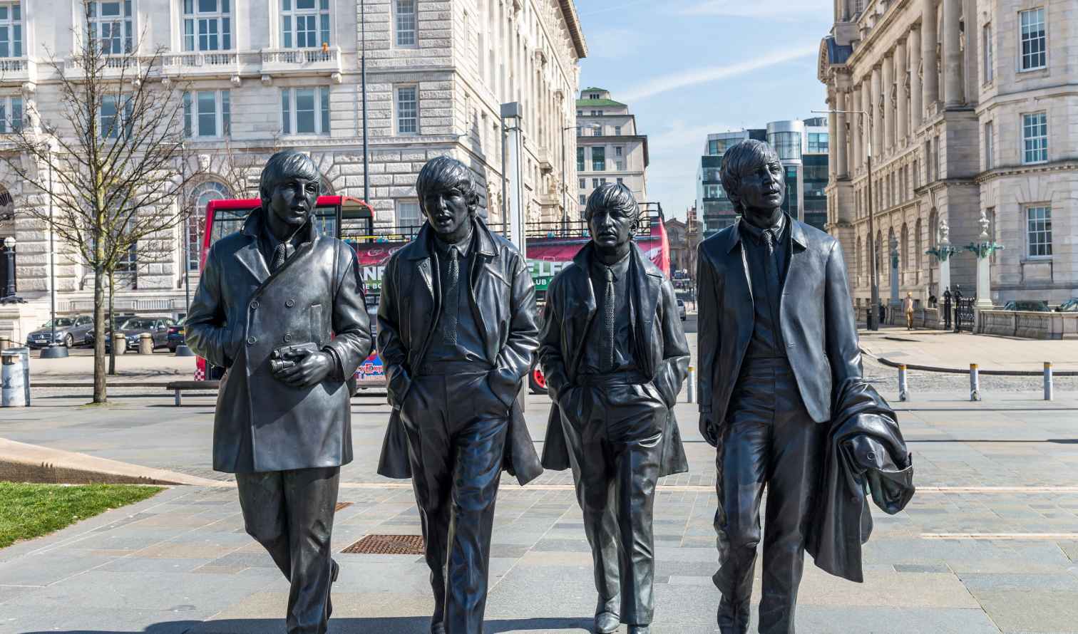 Statue of four figures at Pier Head, Liverpool.