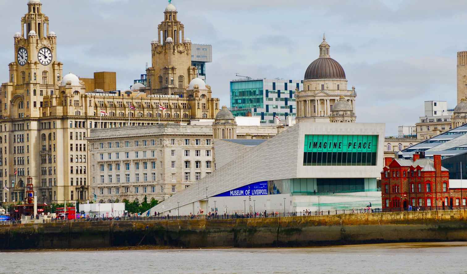Liverpool's Royal Liver Building with Museum of Liverpool in foreground.