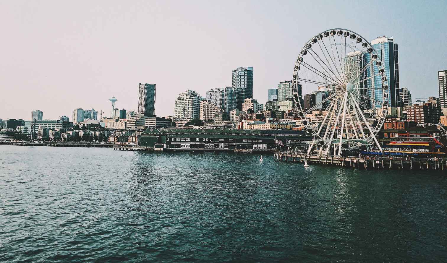 Seattle waterfront with the Ferris wheel and skyline in view.
