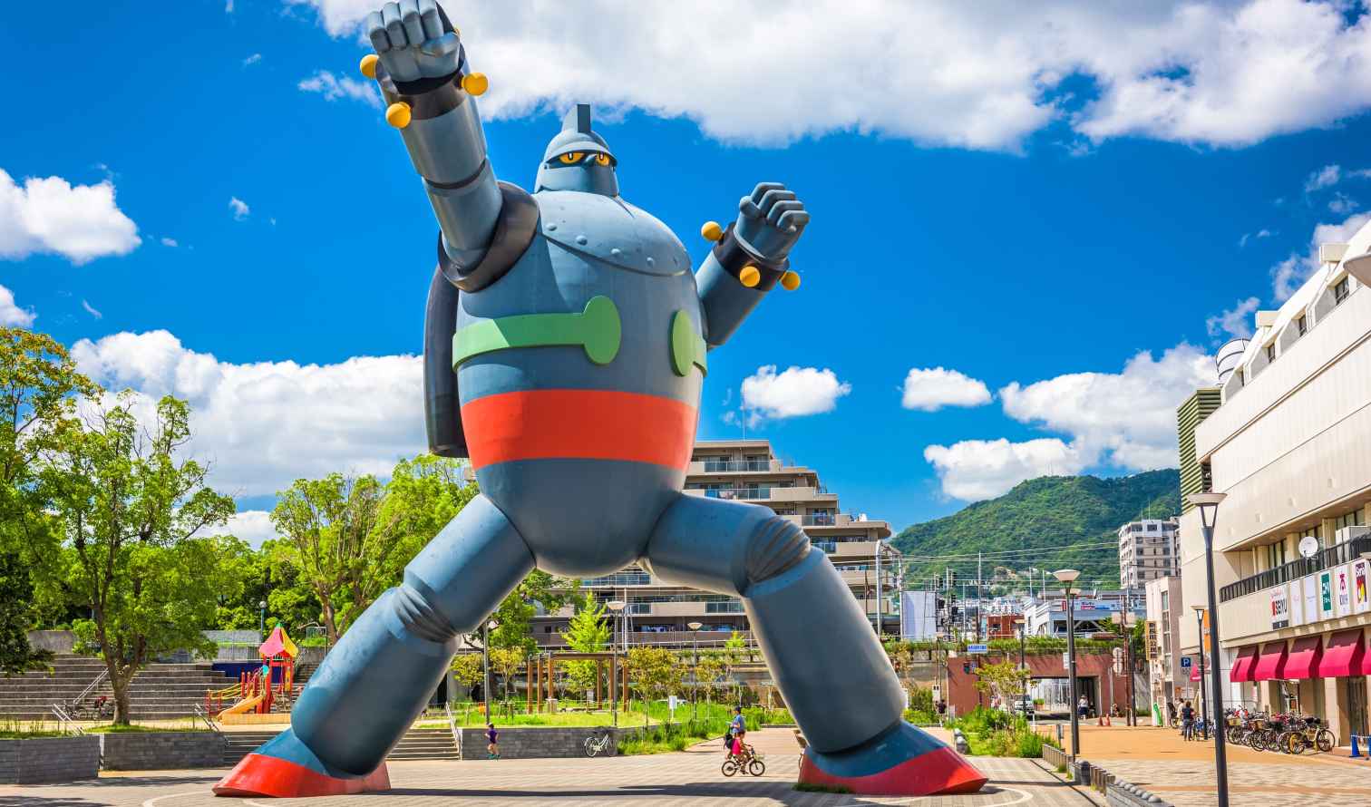 Giant robot statue in Wakamatsu Park, Kobe, Japan with blue sky background.