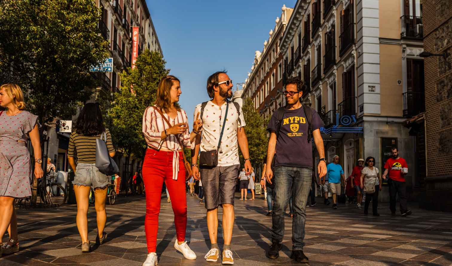 People walking on Calle del Pez, Madrid.